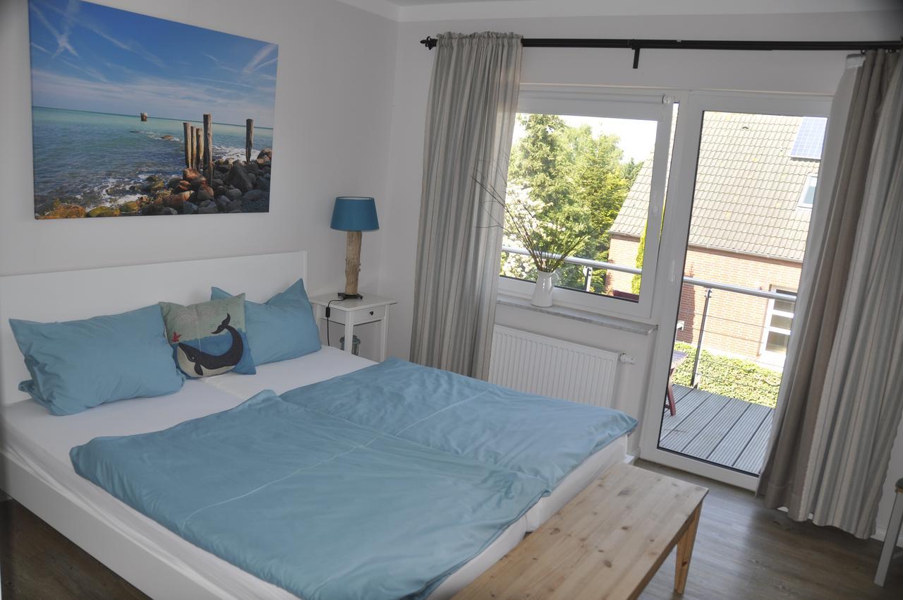 Hotel & Ferienunterkuenfte Hus Seeblick Fehmarn Exterior foto