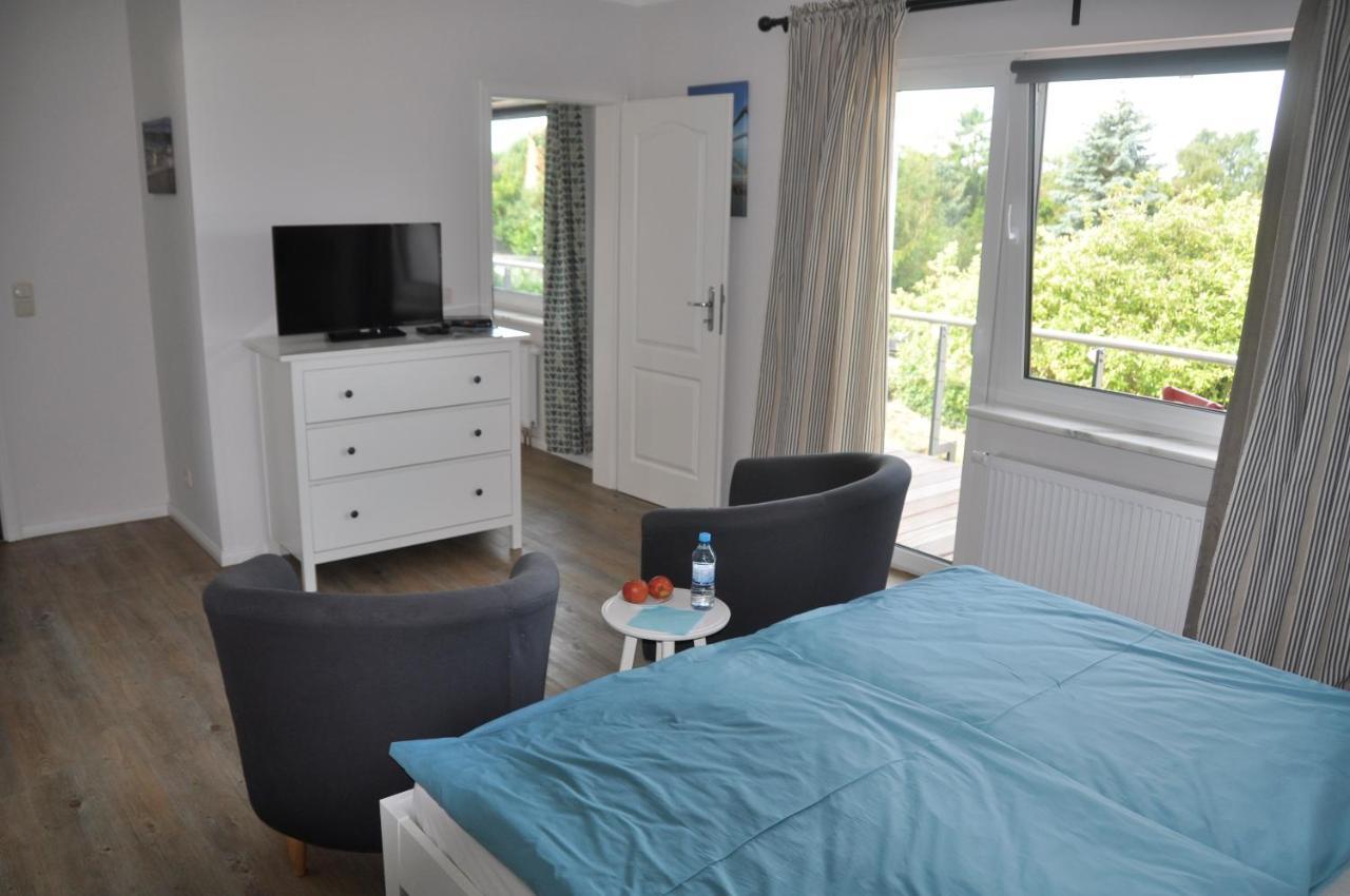 Hotel & Ferienunterkuenfte Hus Seeblick Fehmarn Exterior foto